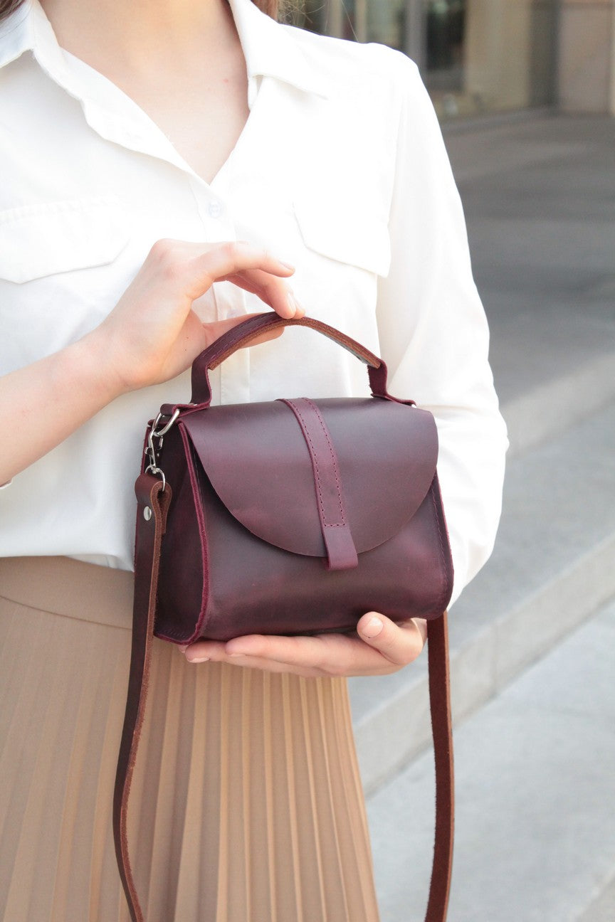 Purple leather handbag